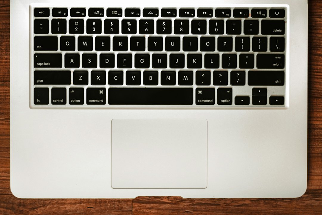 Laptop keyboard with a padlock icon symbolizing secure communication