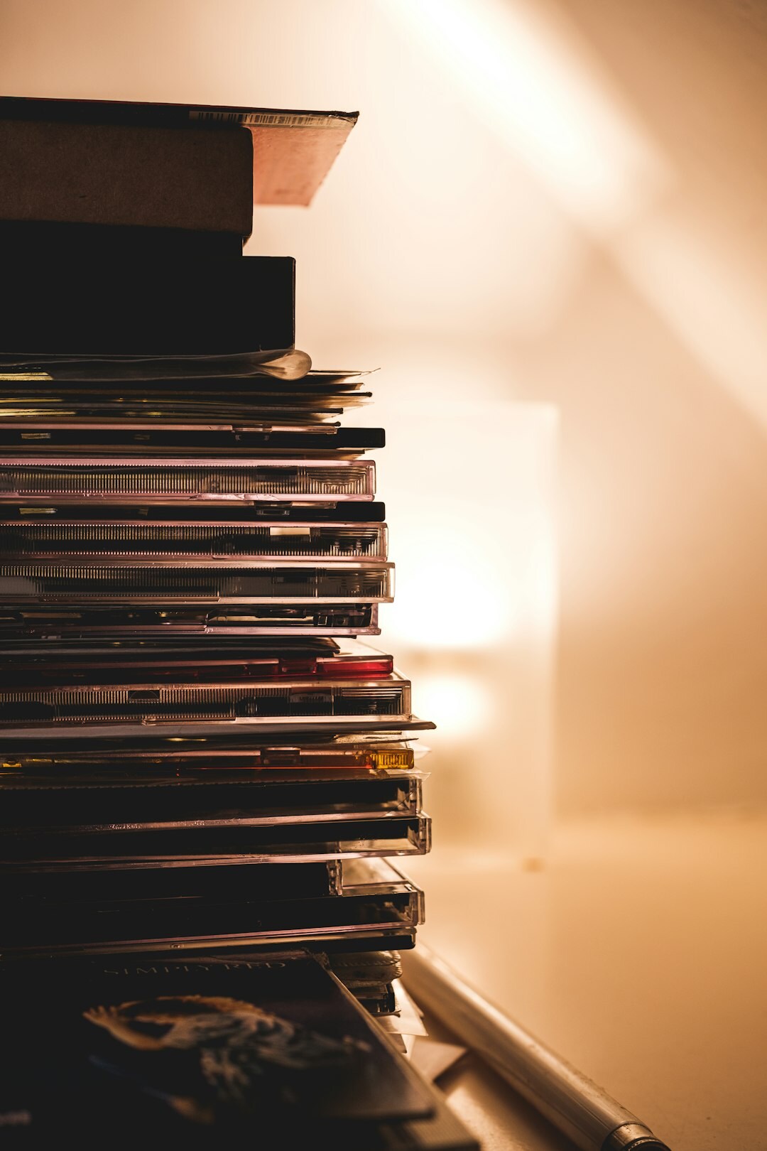 Stack of confidential paper documents and files on a desk