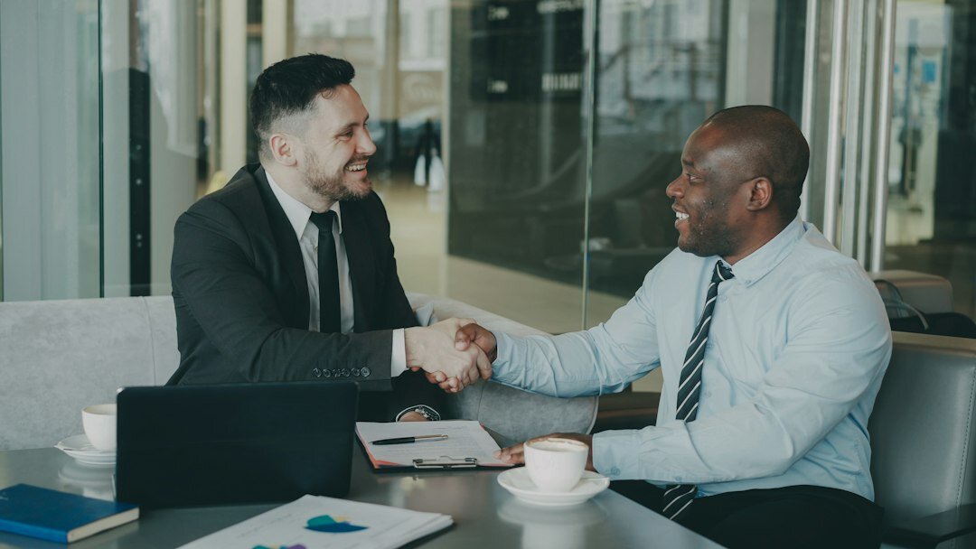 business merger handshake